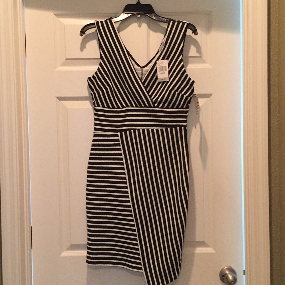 Well made body-con dress with tags!